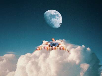 photo-illustration of a man sleeping on a cloud 