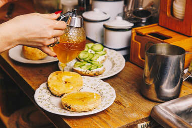 bagels with butter honey cream cheese and cucumber 