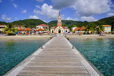 boardwalk leading to town of grande anse