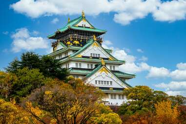 osaka castle amongst fall foliage