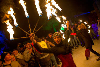 a firedancer entertains the crowd