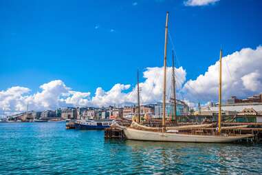 sailboats docked on scenic harbor of oslo in aker brygge 