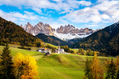 santa maddalena village surrounded by dolomite mountains