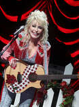 Dolly Parton performs on stage