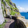 woman exploring skellig michael, county kerry, ireland